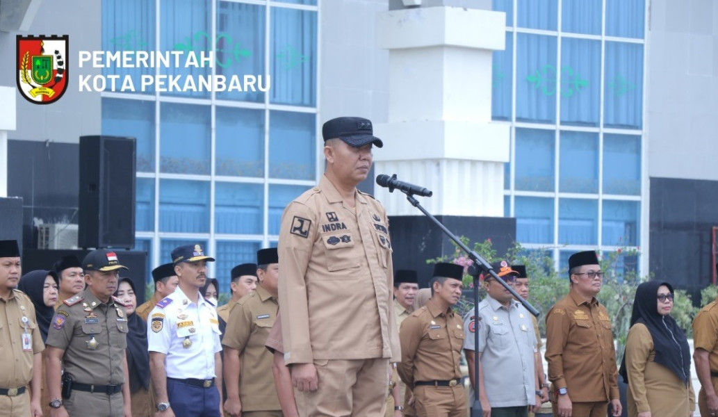 Kepala BPKAD Pekanbaru Hadiri Penyerahan LPPD tahun 2022 Kepada OPD Berprestasi