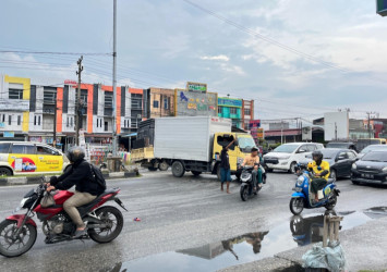 Warga Keluhkan Aktivitas Pak Ogah di Sejumlah Jalan Pekanbaru