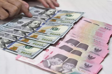 Nilai Tukar Rupiah Terkoreksi, Sentuh Rp 16.450 per Dolar AS