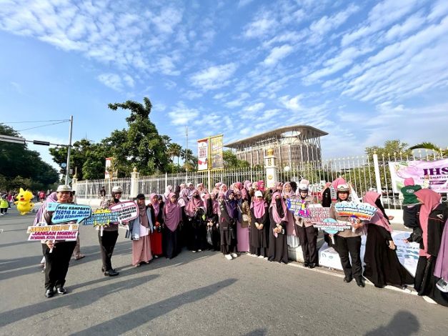 Ditlantas Polda Riau Kampanye Tertib Berlalu Lintas dan Pilkada Aman di CFD Pekanbaru