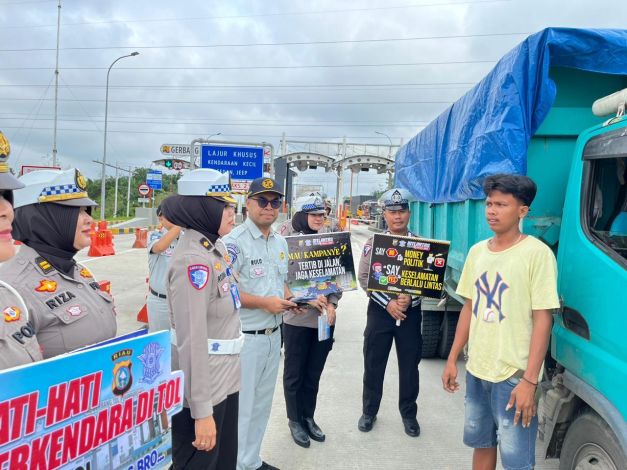 Ditlantas Polda Riau Kampanye Keselamatan dan Pilkada Damai di Gerbang Tol